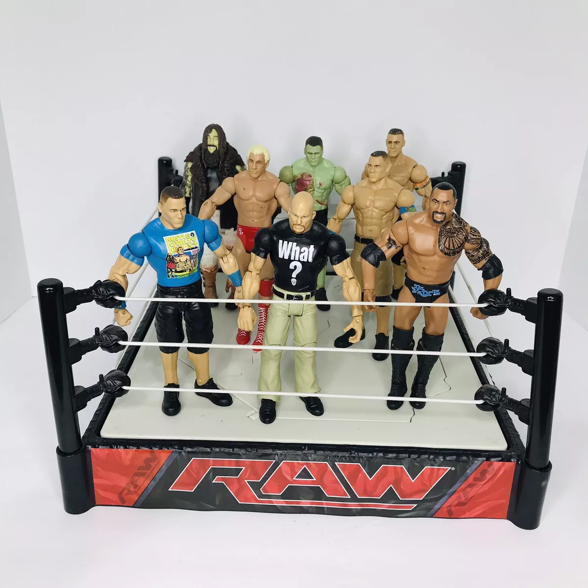 WWE RAW Ring And Wrestling Action Figures Lot Of 8 Cena Rock Stone Cold  Flair