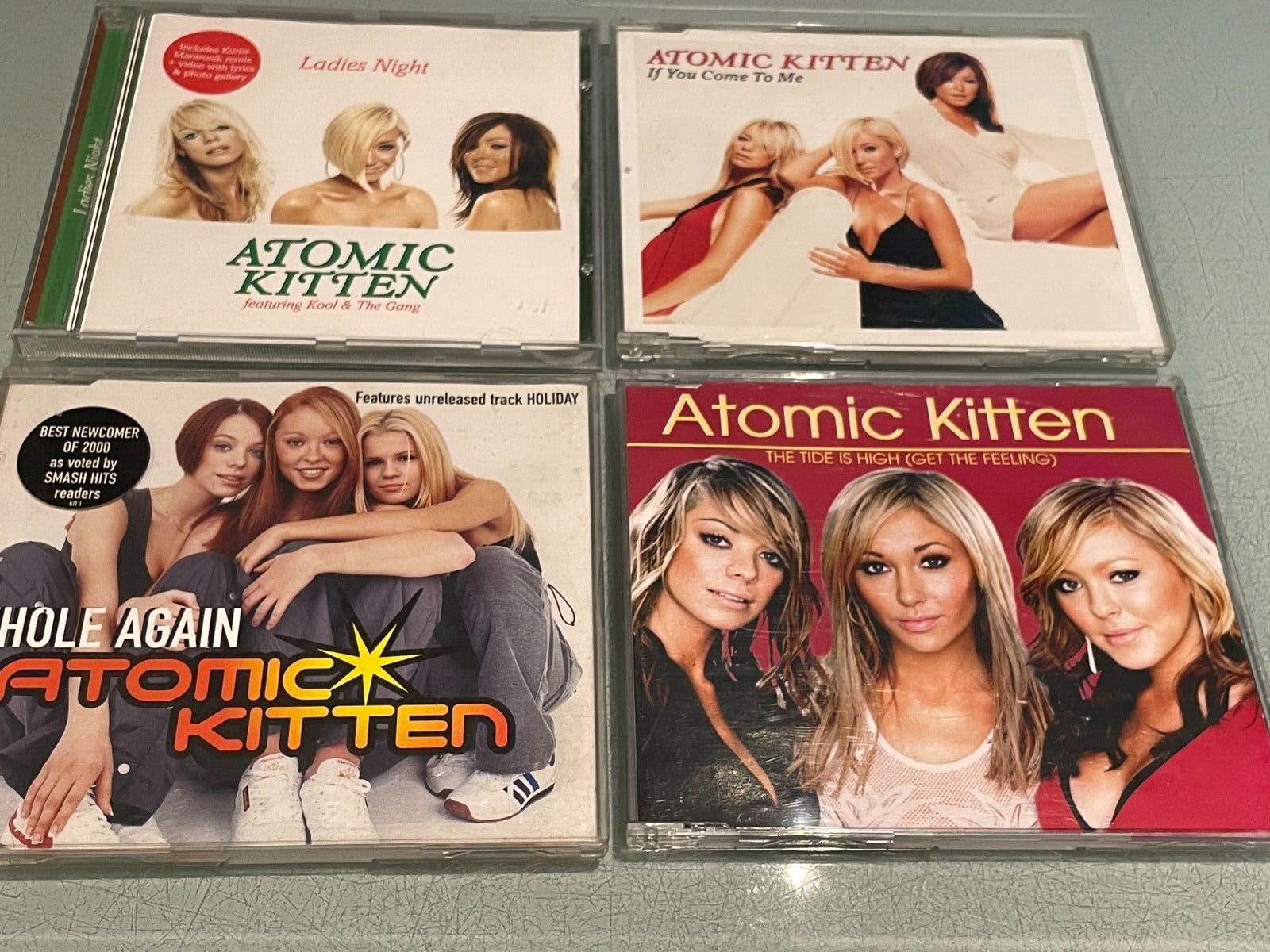 Atomic Kitten - 4 CD Singles - Ladies Night, Whole Again, The Tide is High etc