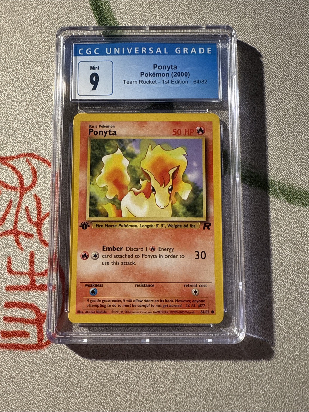 CGC MINT 9 Ponyta 64/82 Team Rocket - 1st Edition Pokemon 2000