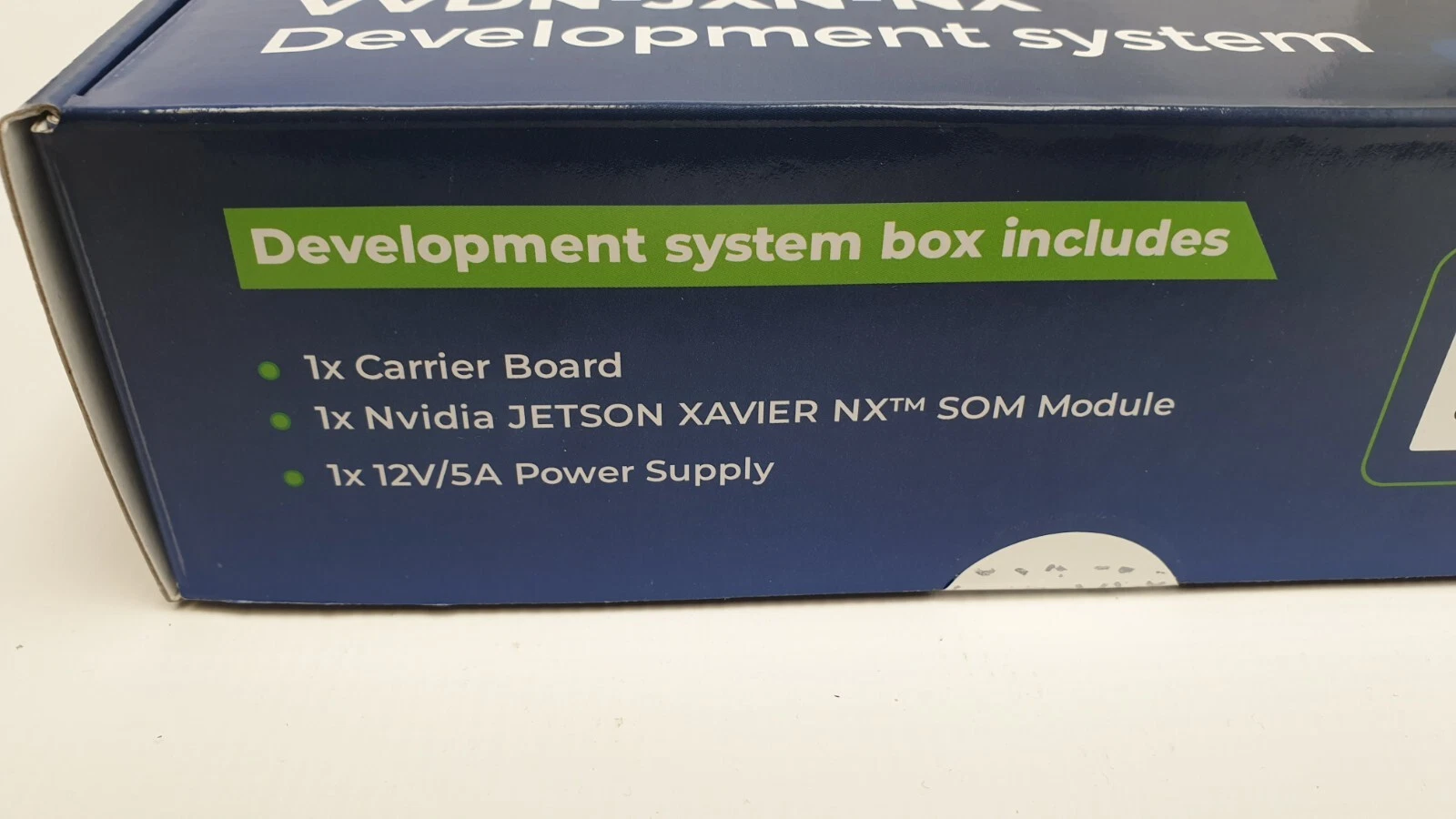 Box side: includes carrier board, Jetson Xavier NX SOM module, 12V/5A power supply