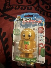 Holiday Wind Up Pooper Gingerbread Walking Candy Dispenser Poops Candy
