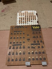 vintage Yale And Union  key display board  labeled for specific key plugs
