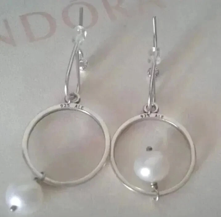 Orecchini pandora fuori produzione originali..perla D Acqua Marina - Immagine 2 di 3