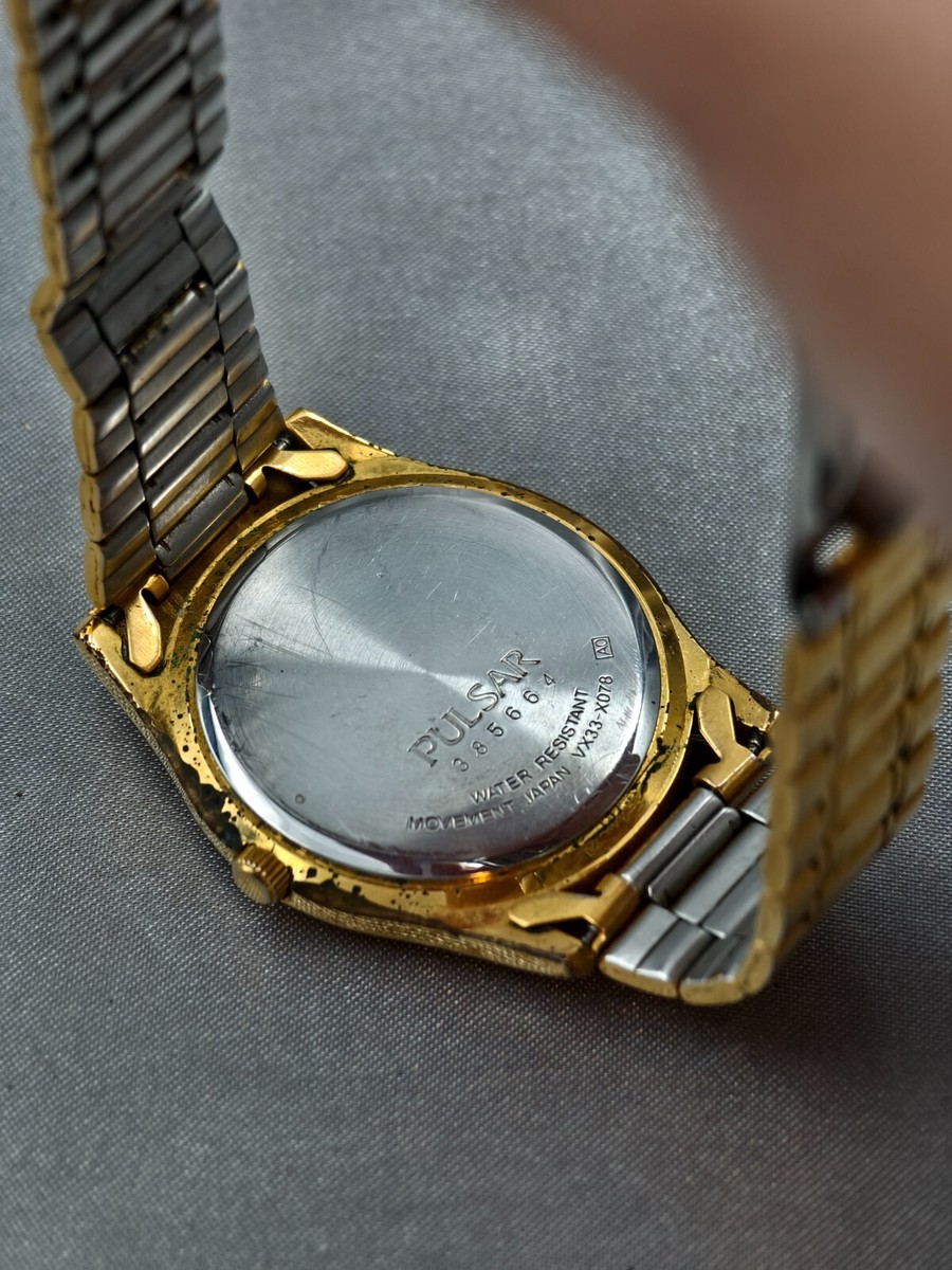 Vintage Pulsar by Seiko Mens Day Date Black Dial Gold Tone