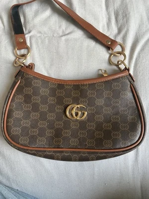 Gucci Damen Schultertasche GG Leder Braun Halbmond Reißverschluss Gold Hardware - Bild 1 von 3