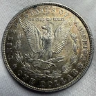 *Toner* 1885 Morgan Silver Dollar (AU)