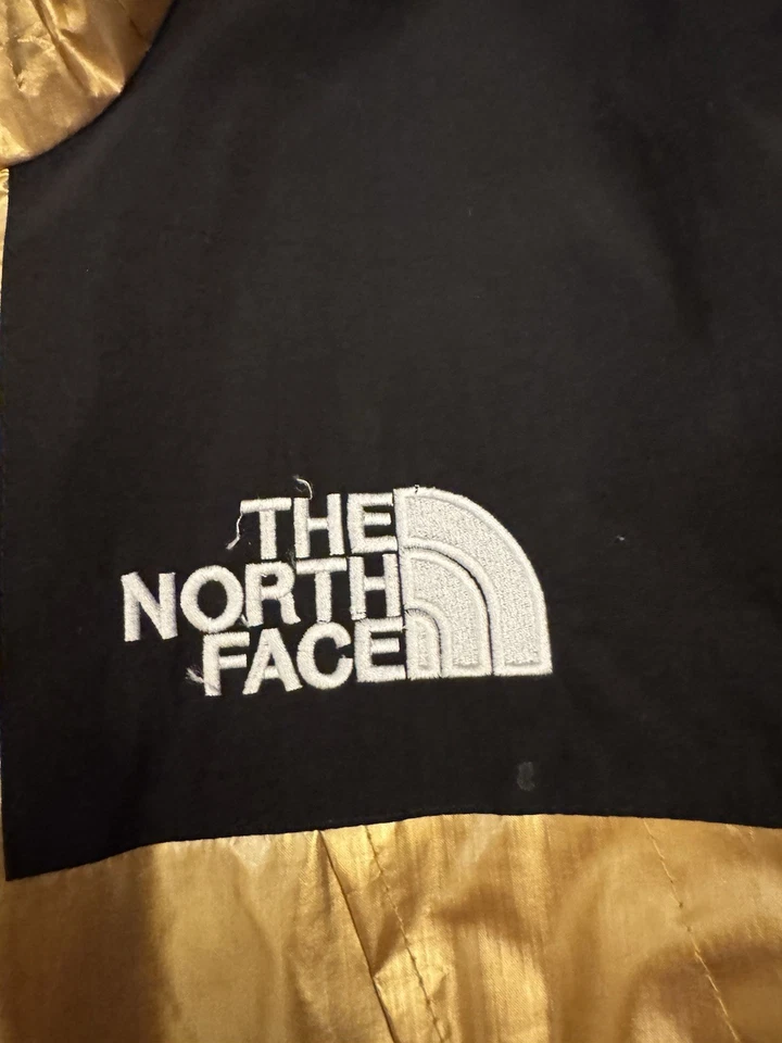 Parka de montaña metálica Supreme The North Face TNF dorada talla pequeña SS18 rara original Foto 3 de 4
