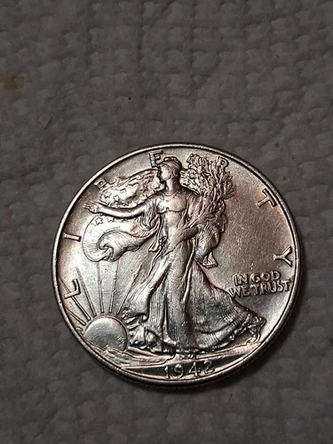 1942 Walking Liberty Half Dollar In F To VF Condition In My Opinion. #411