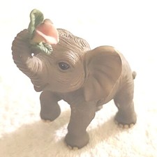 Vintage Elephant Figurine With Flower