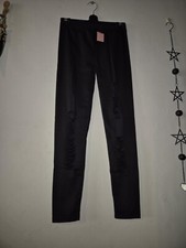 Black ripped look leggings. One size.