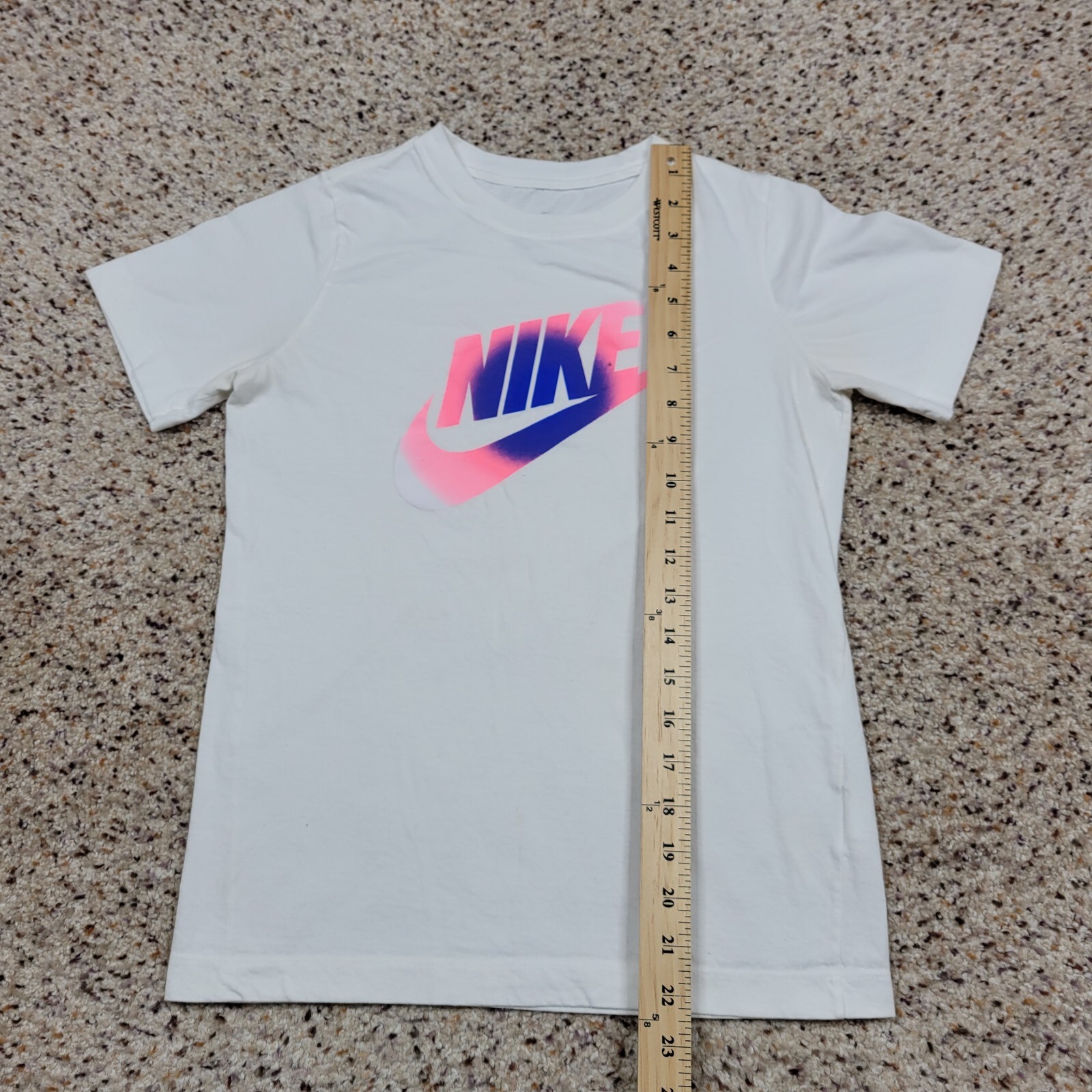 pink and white nike shirt