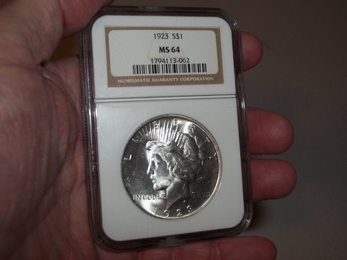Vintage Antique 1923 NGC MS64 Peace Dollar 90% Silver nice features (062) - Bild 1 von 4