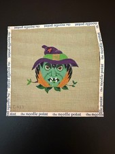 Halloween needlepoint canvas of a witch pumpkin. 18 Count mesh. Preowned.