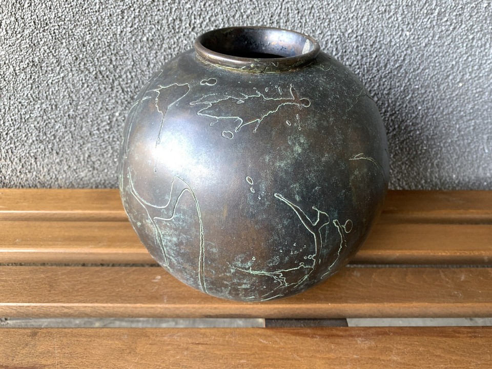 Maitland-Smith is a premier name in high-end decorative arts — a vintage metal vase/sculpture from them at $450 is actually a reasonable ask for what it is.