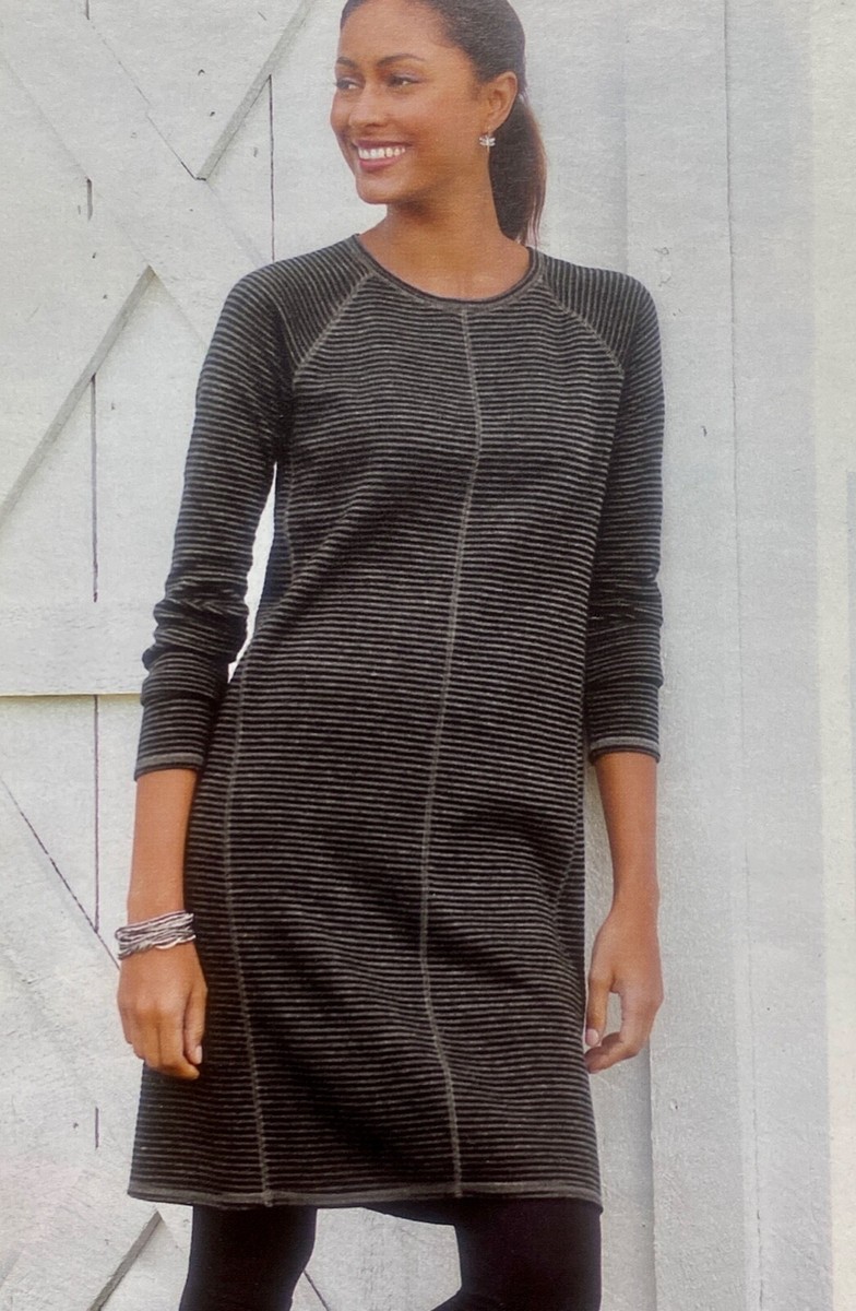 olive green dress black tights A chic olive-green mini dress with a sleek high neckline and a fitted  silhouette, finished with delicate layered ruffles for a touch of movement  and elegance. Designed to transition effortlessly from daytime