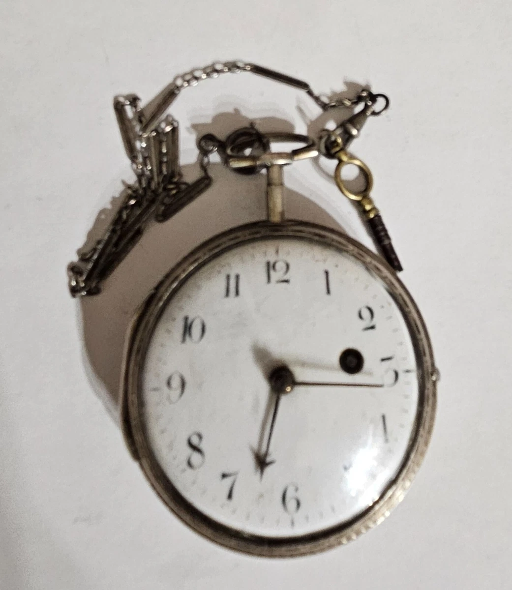 MONTRE DE GOUSSET à coq en or jaune ciselé, le mouvement signé
