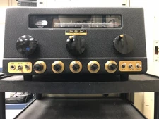 HAMMARLUND PRO-310 SHORTWAVE RECEIVER THAT IS GRAY IN COLOR AND NICE TO LOOK AT.