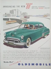 1949 vintage blue Oldsmobile automobile print ad Post War ll. 