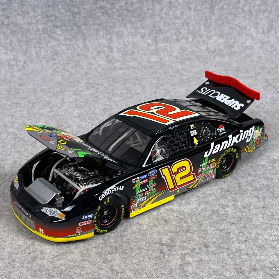 Action 1:24 Kerry Earnhardt #12 JaniKing Looney Tunes 2002 Monte Carlo Diecast - Image 2 of 4