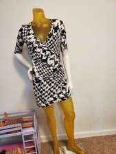 Guess Women dress  bodycon Half Sleeve   size tag 0 ,XS, fits well to S ,M..