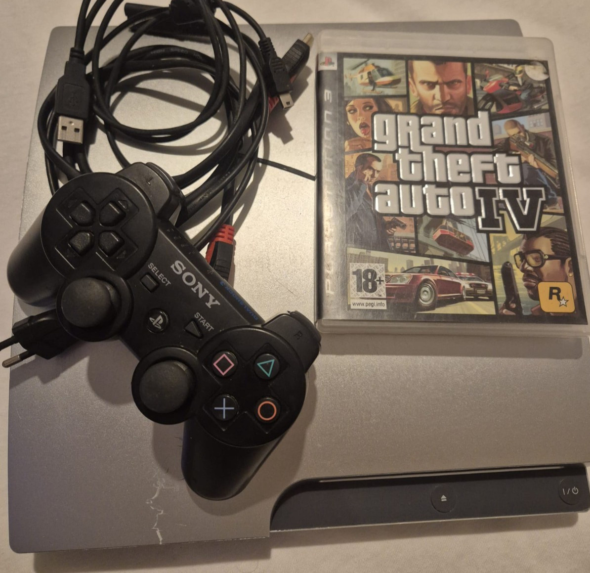 Sony PlayStation 3 PS3 Slim Silver Console + Manette + GTA IV – Fonctionnelle