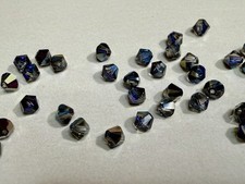 Swarovski - Crystal Heliotrope - 5328 - 4mm Bicone Beads