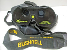 BINOCULAIRES BUSHNELL 13-0421 900 pieds FOV 4x21 avec étui souple. Beautés.