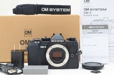 OLYMPUS OM SYSTEM OM-5 body, original box, and accessories. Shot count: only aro