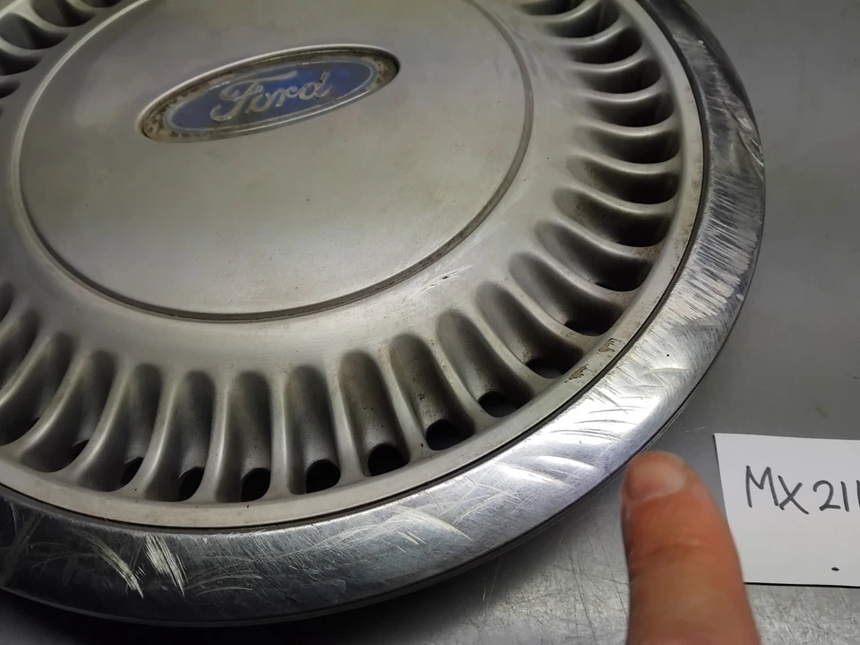 Un tapacubos original 1987 1988 Ford Taurus 14" Foto 4 de 4