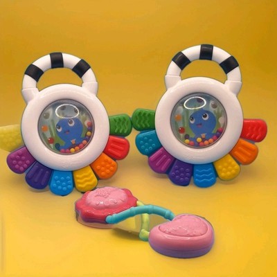 2 Baby Einstein Opus Sensory Teether Rattles  & 1 Bright Starts Pink Rattle.