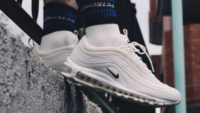 air max 97 reflective logo cream on feet