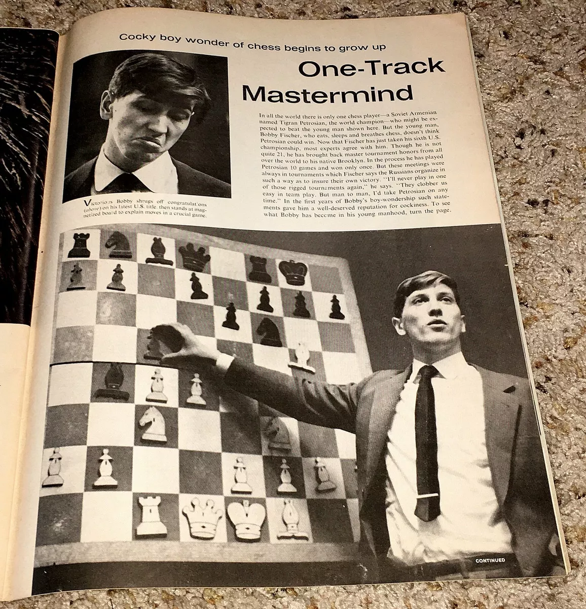 Bobby Fischer at Chess Board with Newspaper Bobby the Champ