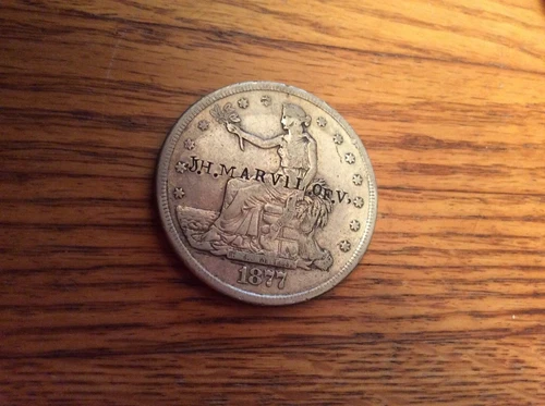 1877 S Trade Silver Dollar counter stamped  J.H. MARVILL OF V.