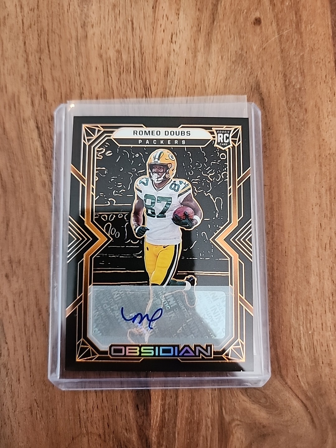 2022 Panini Obsidian Electric Etch Orange #140 Romeo Doubs RC Rookie AUTO /75