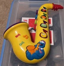 VTG 1999 Sesame Street Musical Saxophone Cookie Monster Talks  Lights Up Mattel