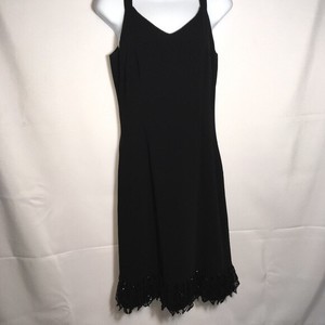 black dress with fringe bottom