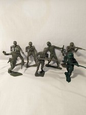 Lot of 9 Vintage Green Soldier Army Men Unmarked and One Marked Louis Marx