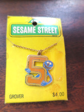 Vintage Sesame Street Grover Number 5 Gold Tone Pendant Necklace NEW OLD STOCK