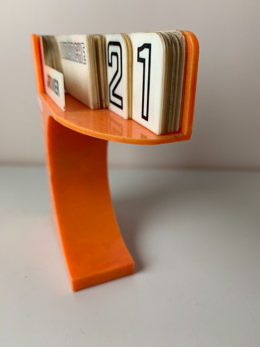 Kitsch et Vintage 70's. Calendrier Manuel Bonhomme Orange en très bon