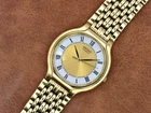 Vintage Seiko Quartz Gold Tone Roman Dial Tonneau Tortue Dress Watch V701-6K69