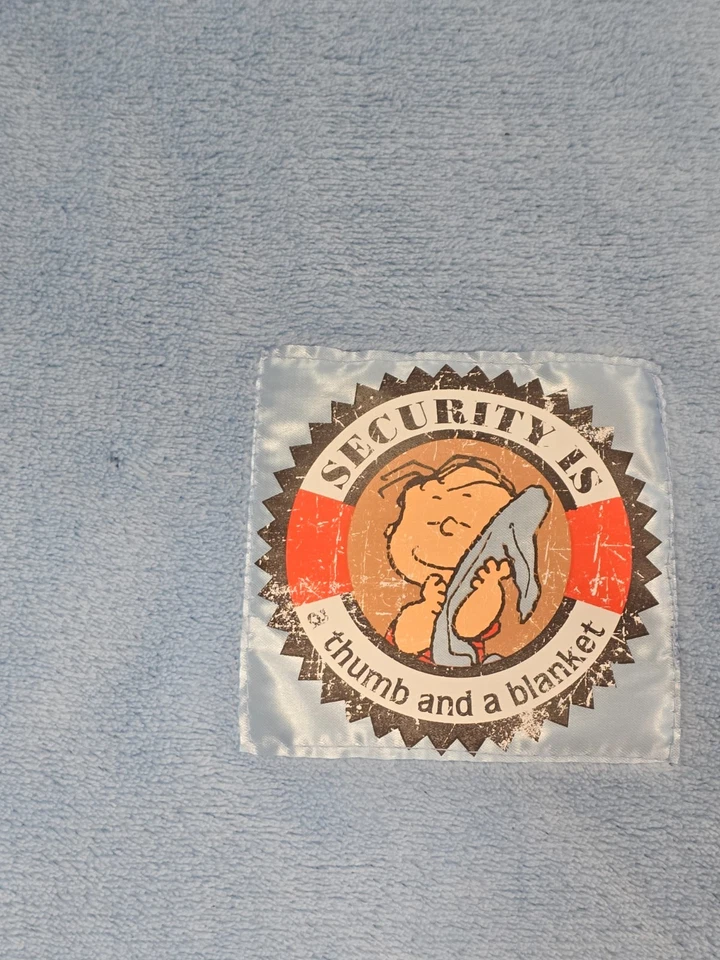 Manta azul felpa Peanuts Linus Security is a Thumb Lovey 29" x 29" satinado Foto 2 de 4