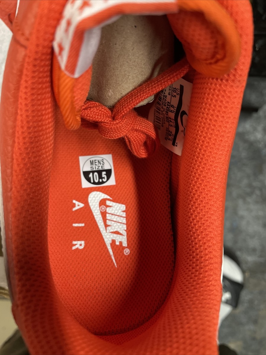 nike trainers with orange tag