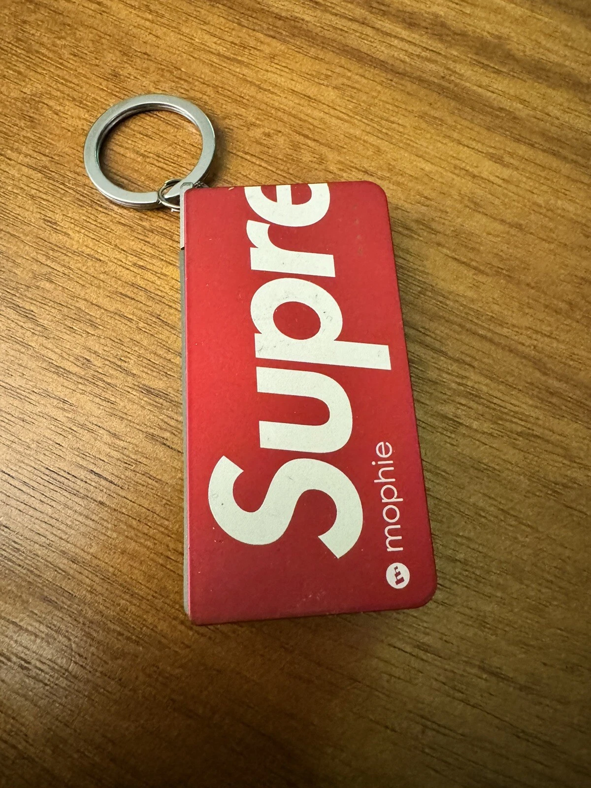 Porte clés Supreme Mophie réserve de marche rouge SS15