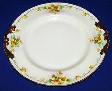 GORGEOUS PL LIMOGES FRANCE SIGNED STEVE HANDPAINTED YELLOW FLORAL HANDLED PLATE