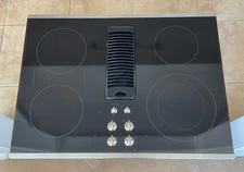 GE Profile 30” Black Electric Downdraft Cooktop, Radiant Glass & Stainless Trim