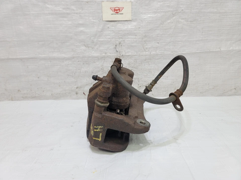 Pinza de freno delantera izquierda Lexus RX450h 2010-2015 OEM 47750-0E031 Foto 4 de 4