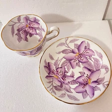 ROYAL CHELSEA ENGLISH BONE CHINA PURPLE LILLY IRIS MAGNOLIA GOLD TEACUP SAUCER