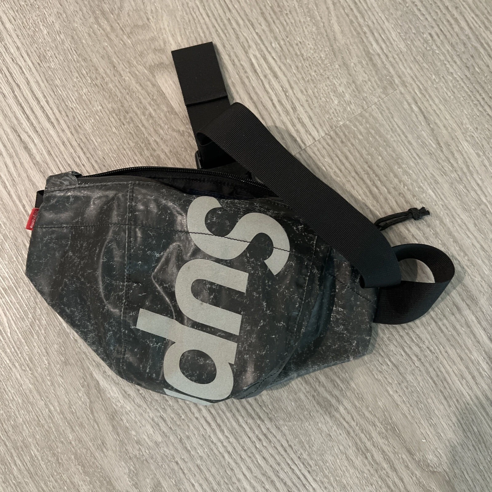 Sac taille mouchetée réfléchissant imperméable suprême « noir » FW20