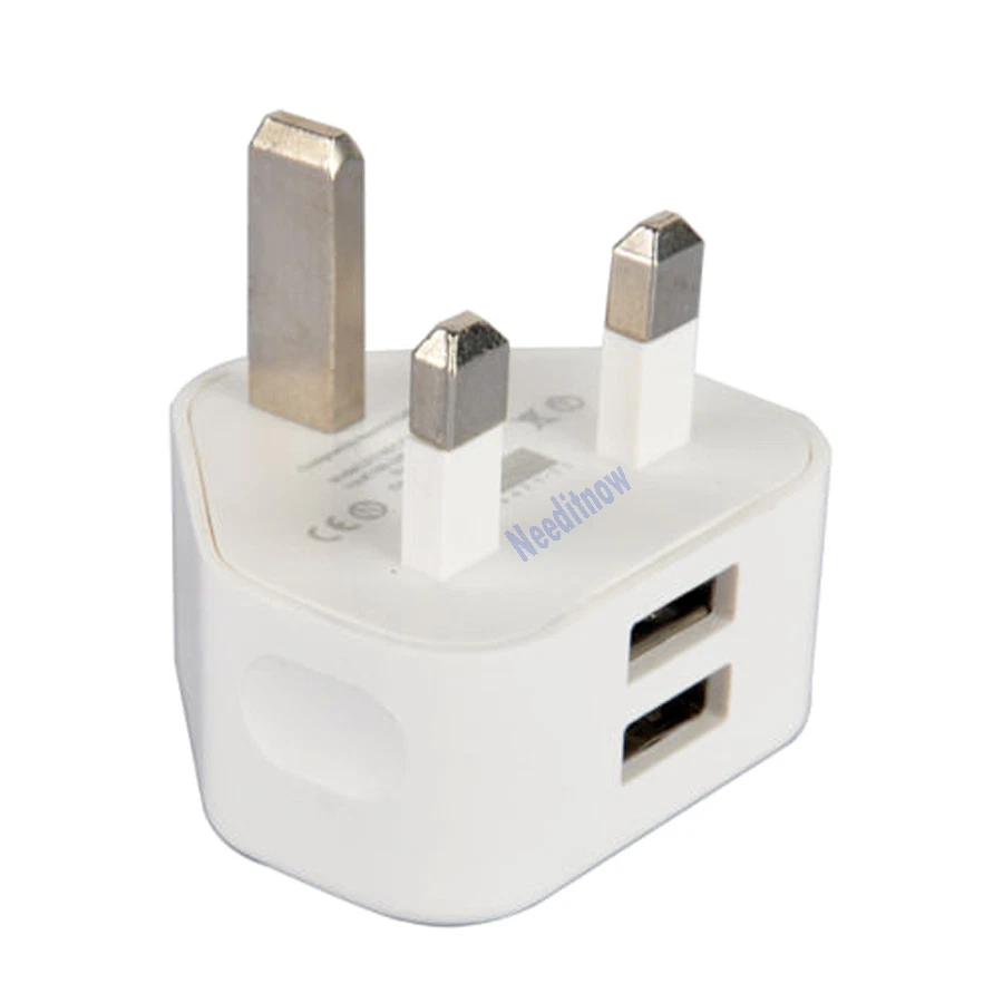 ADAPTADOR CARGADOR ENCHUFE PARED AC DOBLE USB UK BLANCO 2A PARA TODOS iPhones SAMSUNG HTC  Foto 2 de 2