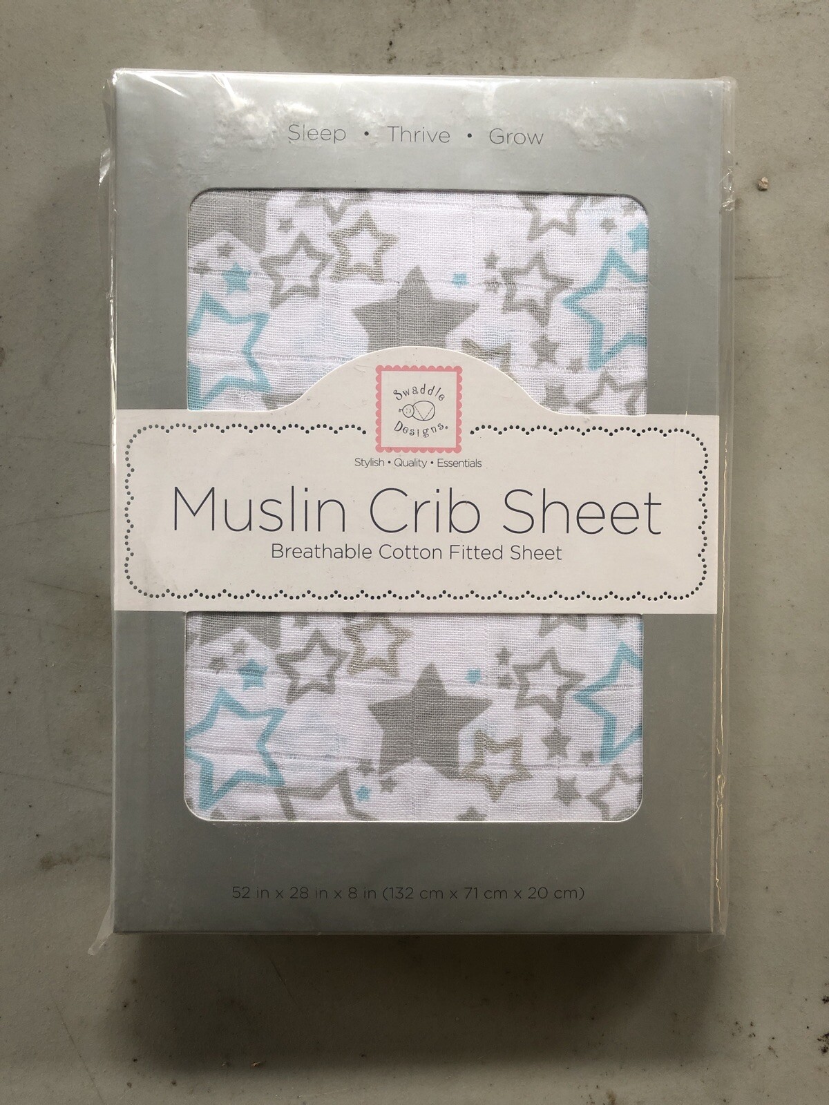 white muslin crib sheet